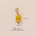 Yellow popsicle charm pendant in stainless steel with a cute smiling face detail - Smiley Popsicle Style