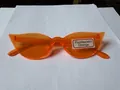 Retro neon orange cat-eye sunglasses with irregular candy-colored plastic frames - Fluorescent Orange