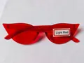 Candy-colored red cat-eye sunglasses with irregular frames for European and American style. - Light Red