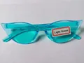 Neon blue cat eye sunglasses with irregular frame in candy colors for trendy street style - Fluorescent Blue