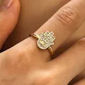 Golden Hamsa hand ring with micro-paved evil eye and cubic zirconia detail - Hamsa Hand Evil Eye Style (A-805) / KC Gold
