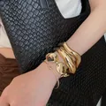 Chic 4-piece set of golden metallic irregular open bracelets for a bold fashion look. - 25# Bracelet - Gold (four-piece Set)
