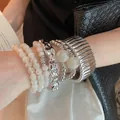 Trendy 4-piece silver metallic bracelet set featuring irregular shapes and elegant white beads - 17# Bracelet - Gold - White - Glass (7-piece Set)