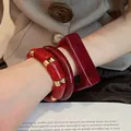 Chunky red resin bangle set with gold-tone beaded bracelets for women's fashion jewelry - 33# Bracelet - Red (three-piece Set)