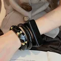 Elegant black resin and gold metallic bangle set for women, stylish wrist jewelry - 37# Bracelet - Black (three-piece Set)