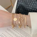 Set of 4 minimalist gold-tone metal open cuff bracelets with elegant geometric designs - 23# Bracelet - Gold (5-piece Set)