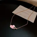 Elegant rose gold necklace featuring a heart and zircon-studded circle pendant for women - Rose Gold