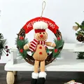 Close-up of a festive knitted gingerbread man on a grapevine wreath for Christmas decor - Gingerbread Man Chef Hat Wreath