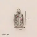 Ciondolo a forma di valigia in acciaio inox con gemma cuore rosa e dettagli aereo - Bagaglio / Argento