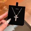 Elegant silver cross pendant necklace with cubic zirconia on black velvet display - Cross Pave Rhinestone Pendant (DY156) / Silver