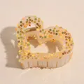 Elegant large heart-shaped hair claw clip featuring golden star glitter in a beige resin finish - Starry Orange