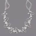 Elegant handmade bridal hair vine with white flowers and pearls for wedding hairstyles. - 37.5cm x 5.5cm / Silver