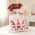 Close-up of burlap Christmas gift bag with gnomes and buffalo plaid drawstring closure - Red and Black Plaid / Large