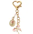 Llavero elegante de metal dorado con tulipán, flor, cierre de corazón y perlas decor - Tulipán Mariposa