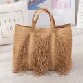 Handmade large capacity straw woven tote bag with fringe tassels for beach vacation - Brown