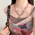 Handgefertigte Vintage-Schmetterlingskette mit Lederband im süßen Cool-Punk-Stil - Halskette Mit Blauem Schmetterling - Dx0309b
