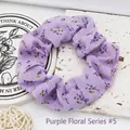 Purple chiffon scrunchie with small floral print on textured stone background - Purple Floral Print 5
