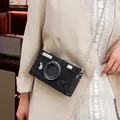 Close-up of vintage camera-shaped hard box crossbody bag with black snakeskin texture - 10 / Black