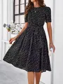 Charming black and white polka dot midi dress with elegant tie-waist detail for women. - S / Tops / Black