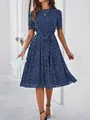 Elegant navy blue polka dot midi dress with short sleeves and a stylish belted waist design. - S / Tops / Blue