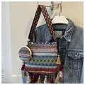 Detailed view of ethnic woven shoulder bag with tassels and matching coin pouch - Two-Piece Set / Blue