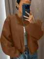 Detailed view of a trendy brown soft bomber jacket for women in a mirror selfie - XXS / Tops / Dark Brown