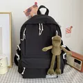 Black minimalist school backpack with cute green frog plush charm - With Random Pendant / Black