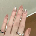 Elegant short oval press-on nails featuring a nude gradient finish with pearlescent bow detail - By2347 / Handmade Nail Art Size M 10 Pieces/bag [tool Kit Included]