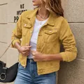 Stylish mustard yellow denim jacket for women featuring turn-down collar and chest pockets - S / Tops / Yellow