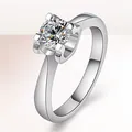 Elegant silver-colored engagement ring featuring a large brilliant round-cut zircon stone - Simple Four-Claw Women's / Silver