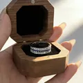 Detailed close-up of a French vintage sapphire and diamond row-set ring in a wooden box. - Adjustable Open / Platinum (Blue Zirconia)