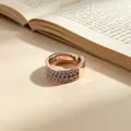 Macro detail of a luxury rose gold ring with three rows of blue and white stones. - Adjustable Open / Champagne Gold (Blue Turquoise)
