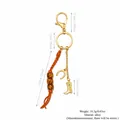 Vintage Western style cowboy boot keychain with orange braided cord and wooden beads - Western Boot Design