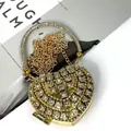 Sac de soirée doré en forme de cœur orné de strass brillants et d'une anse ronde - A158 doré