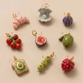 Lot de neuf petits pendentifs en forme de fruits et d'aliments, dont un croissant. - Pendentif Coquillage Perle Artificielle (Pendentif Uniquement (Sans Chaîne))