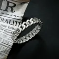 Elegante brazalete abierto de cadena cubana plateada con un acabado de espejo pulido. - Estilo de Cadena Trenzada Plateada (As0006)