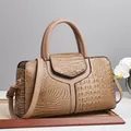 Elegant beige crocodile pattern handbag featuring a Y-stitched design and top handles - Khaki