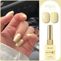Pale yellow macaron gel nail polish #064 for a trendy 2025 manicure professional look - Creamy Yellow (#064)