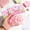 Jouet squishy en forme de fleur de cerisier rose pour le soulagement du stress sensoriel - Style Sakura en Fleur
