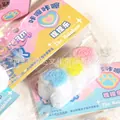 Jouet anti-stress spongieux en forme de fleur de cerisier dans un sac scellé - Style Triple Cœur Glace Pilée