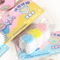 Kristall-Fluid-Sakura-Blüten-Quetschspielzeug zum Stressabbau in Folienverpackung - Dreifach Herz Crushed Ice-Stil