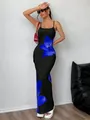 Elegant black bodycon maxi dress featuring a large blue floral pattern and thin straps. - S / Bottoms / Blue