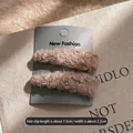 Set di due mollette per capelli in morbido peluche di lana d'agnello marrone su cartoncino - Set di 2 / Marrone