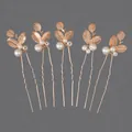 Set of 5 elegant gold-toned U-shaped bridal hairpins with pearls and leaf accents - Forest-themed Floral And Pearl Hairpin Set Hs-j7193g