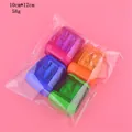 Pack de 4 sacapuntas manuales de colores con doble orificio y tapa transparente en bolsa - 4 Piezas Por Bolsa (como Se Muestra En La Imagen)