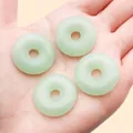 Set of four light green glass Ping An Kou doughnut-shaped pendants for DIY jewelry making. - One 25mm Hole 5.7mm Diameter 26812g 4.2g [green Glass Chinese Style Safety Buckle]