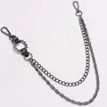 Detailed macro view of a punk rock double-layer metal waist chain with sharp silver spikes - Black Leather Spiked Chain
