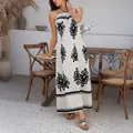 Elegantes weißes Boho-Maxikleid mit Neckholder und markantem schwarzem Stammesmuster - Aprikose