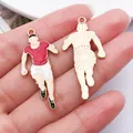 Handmade athlete-shaped enamel charm pendant for DIY jewelry accessories in red and white - 1 Kc Gold-plated Oil-sprinkled Soccer Player 18x38mm 2g 16735