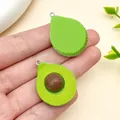 Handcrafted resin avocado pendant for DIY jewelry, featuring realistic fruit detail - Avocado